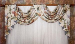 Pole swag and jabot on decorative curtain rod made in contrast fabrics.