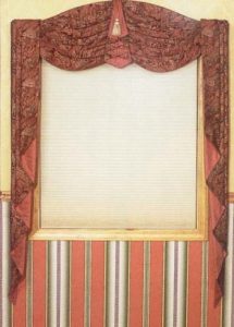 Arch topped swag valance with center inverted pleat pelmet and stacked jabots.